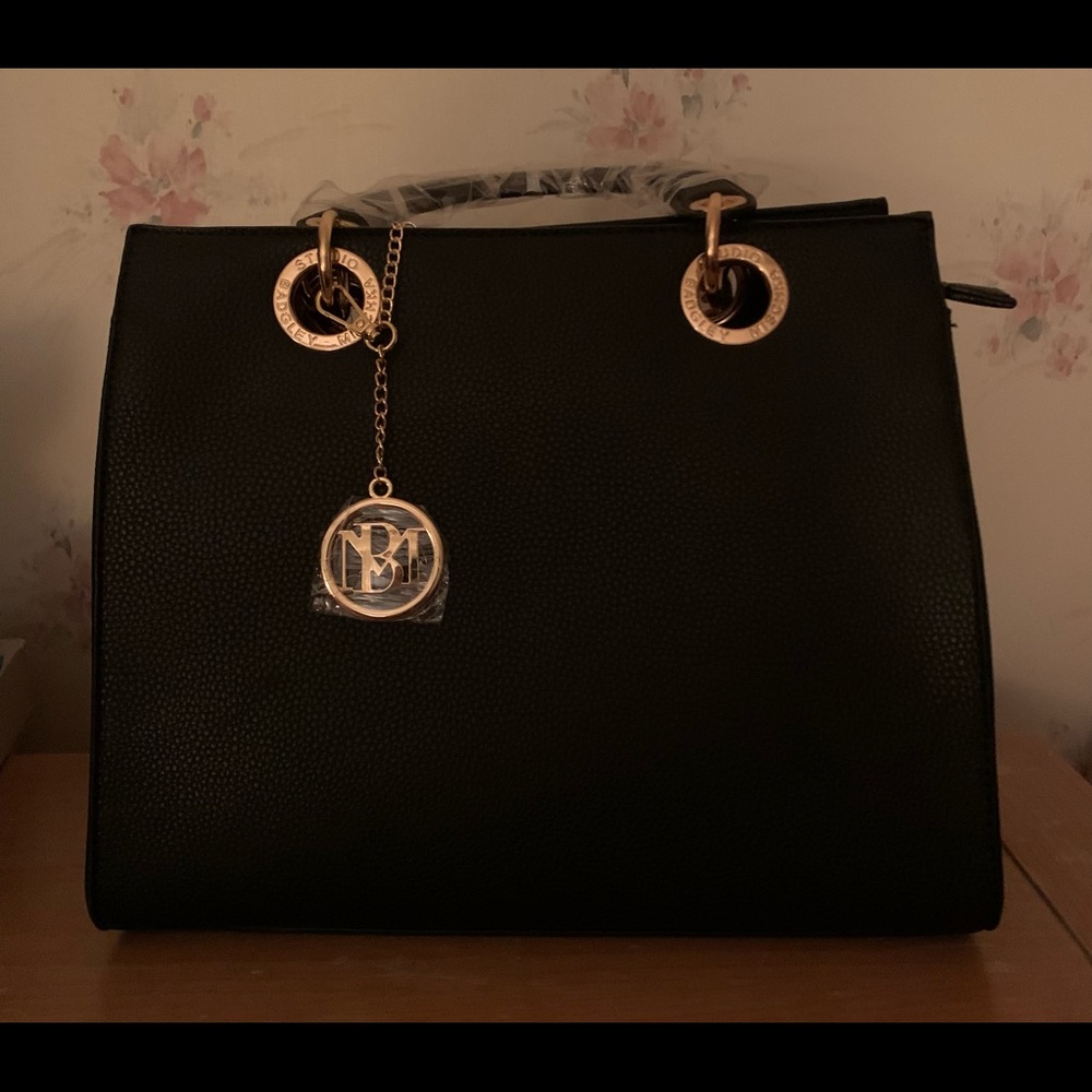 Brand new with tags black and gold Badgley Mischka.